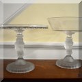 G12. Figural glass stands. 